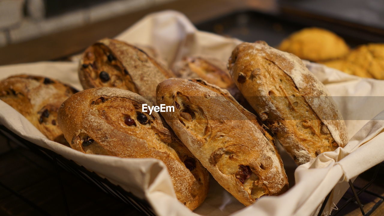 Close-up of bread on textile