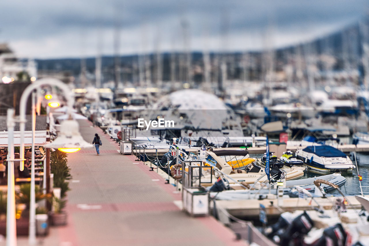 TILT-SHIFT IMAGE OF CITY STREET AND BUILDINGS