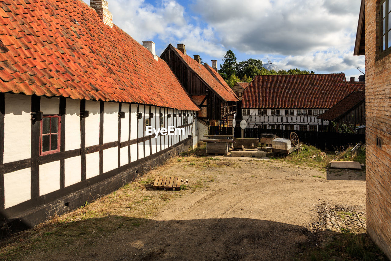 Houses and buildings against sky