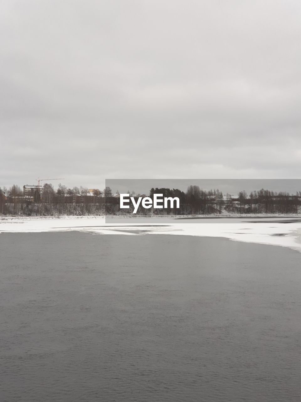 SCENIC VIEW OF SNOW COVERED LAND AGAINST SKY