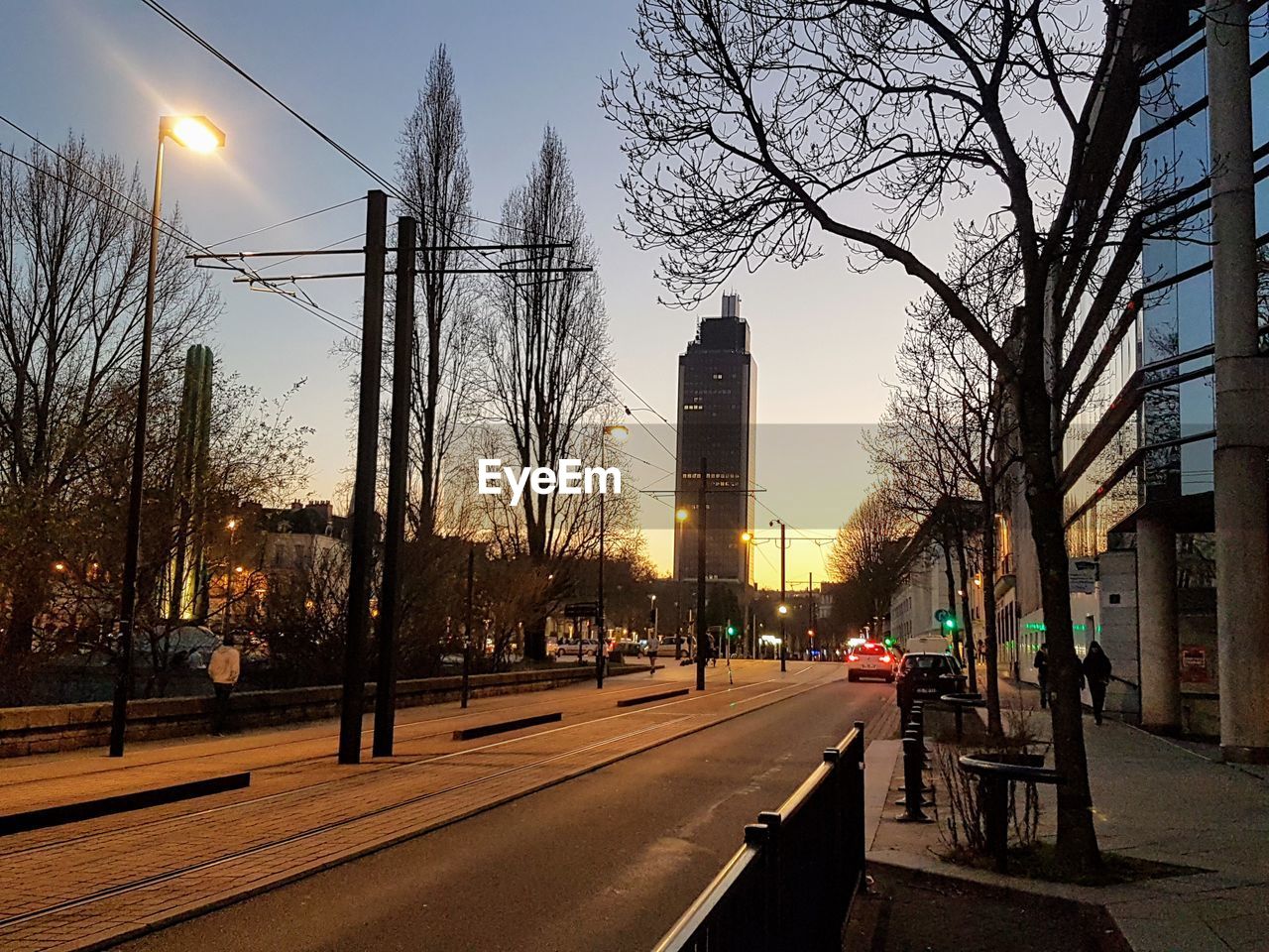 VIEW OF CITY STREET AND BUILDINGS