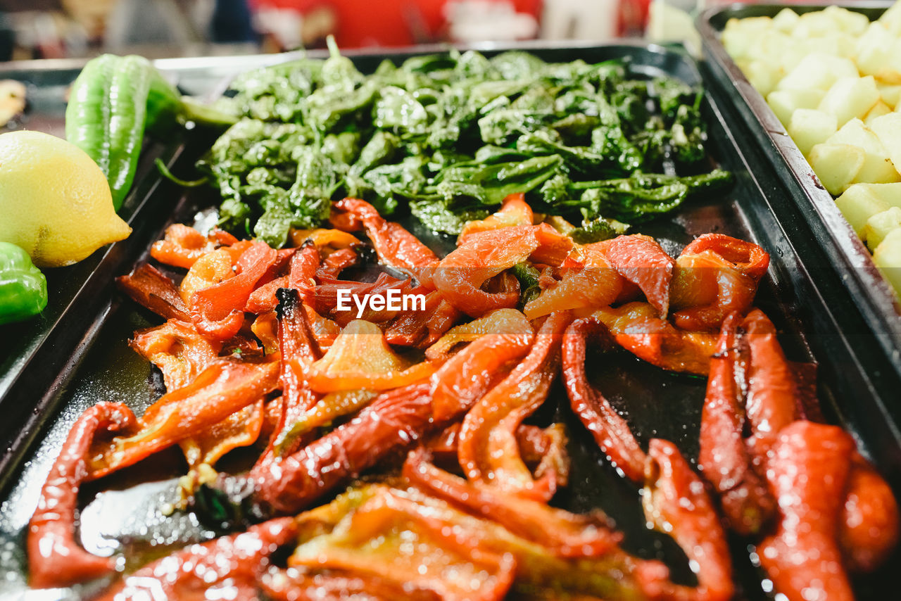 CLOSE-UP OF MEAT WITH VEGETABLES