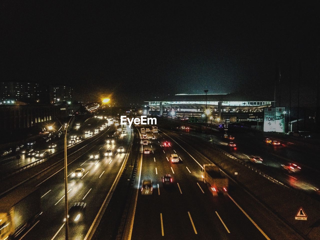 TRAFFIC ON ROAD AT NIGHT