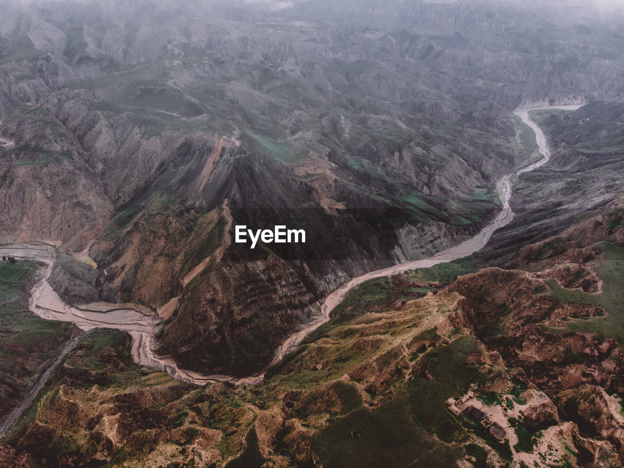 HIGH ANGLE VIEW OF MOUNTAIN RANGE