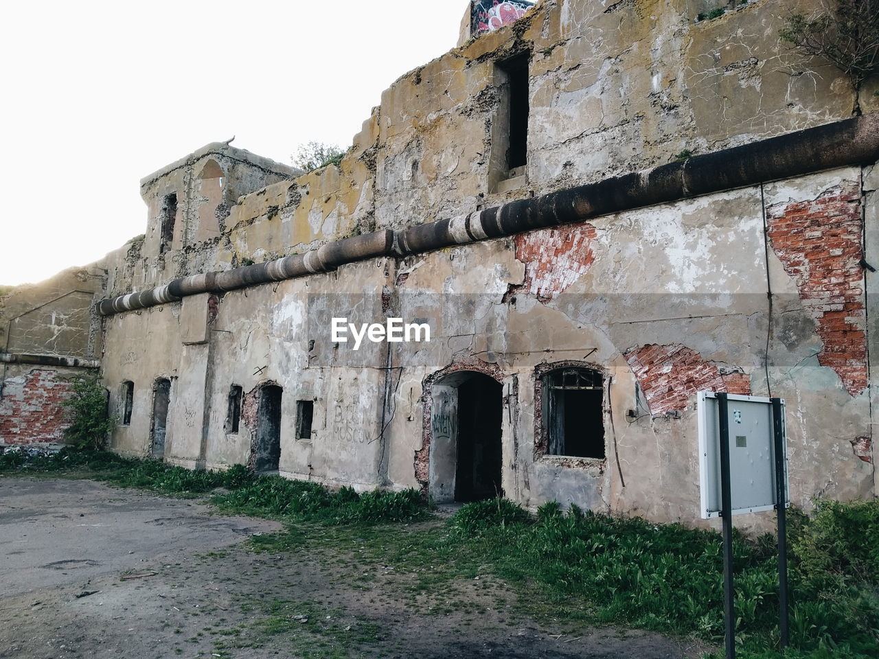 OLD BUILDING AGAINST SKY