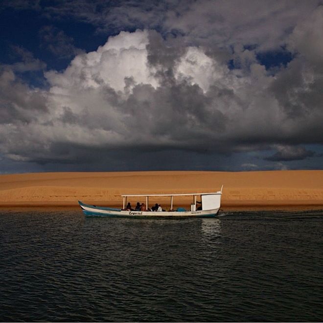 BOATS SAILING IN SEA