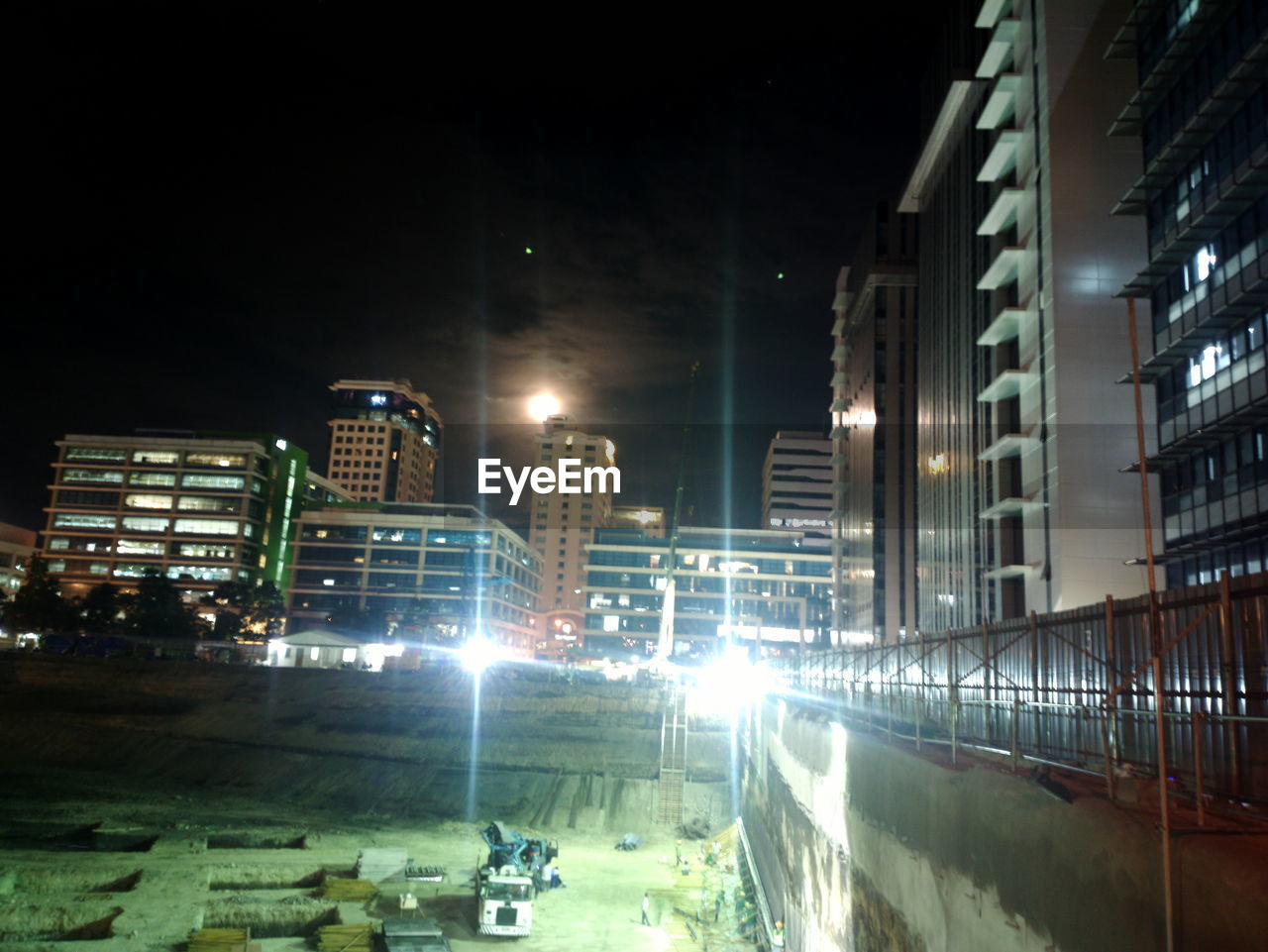 ILLUMINATED CITYSCAPE AT NIGHT