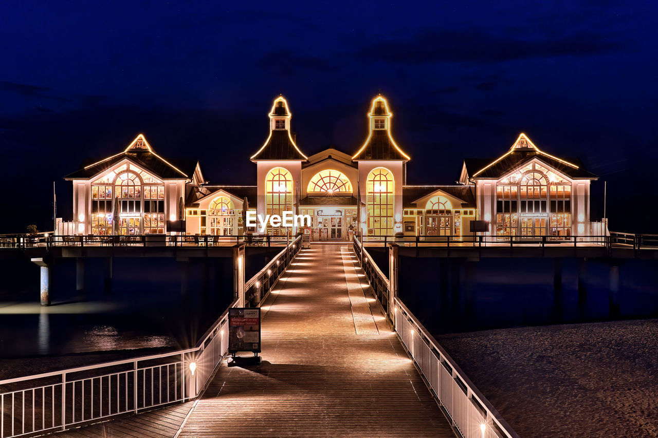 ILLUMINATED BUILDING AT NIGHT