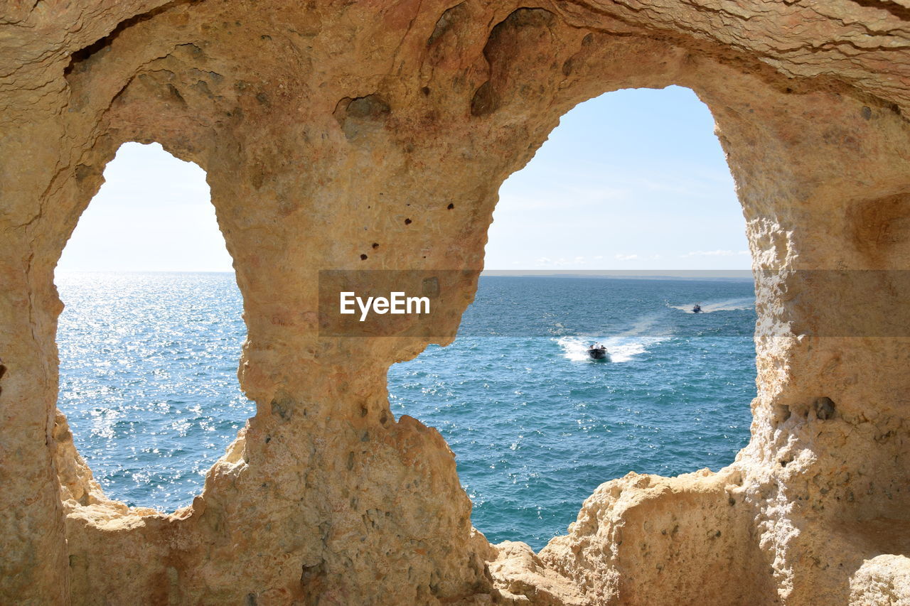 VIEW OF SEA FROM ROCK FORMATION