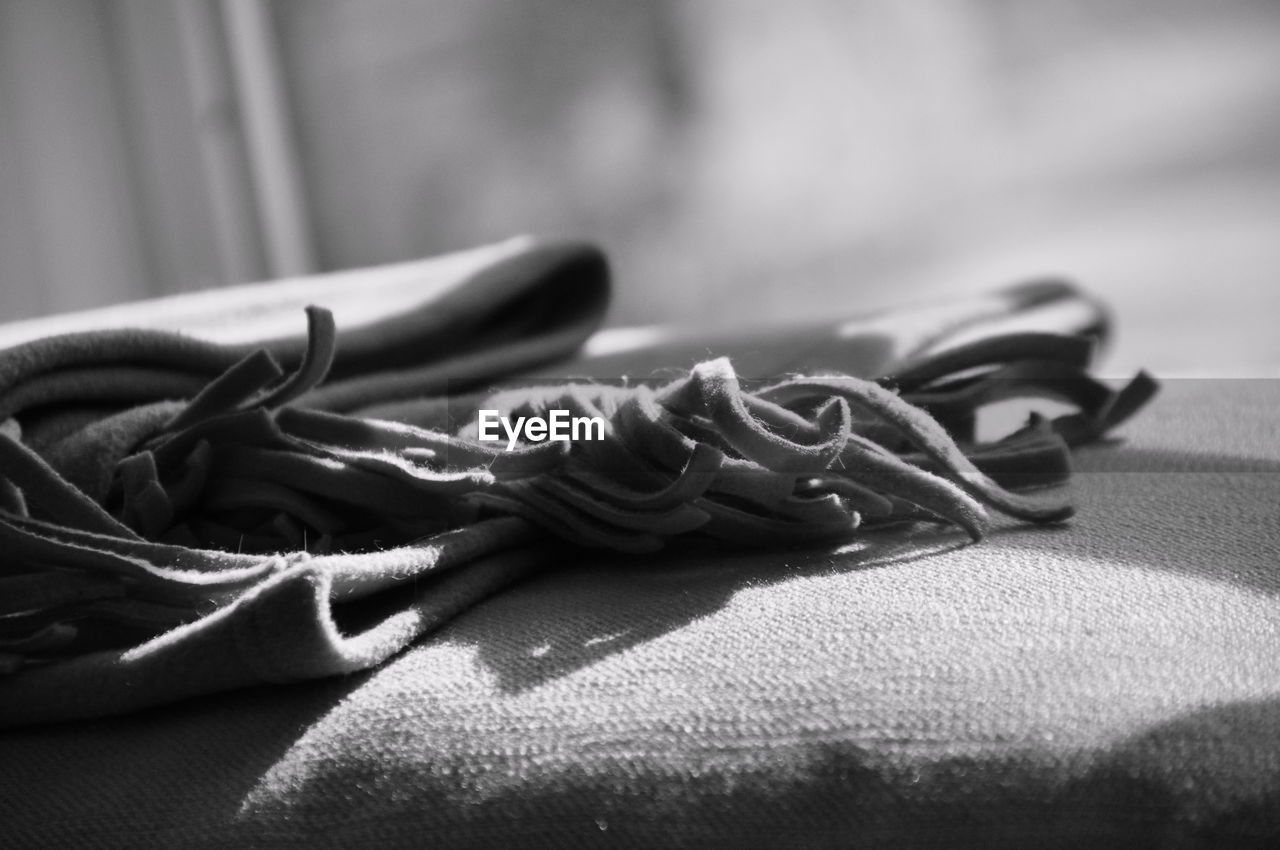 Close-up of rope on table
