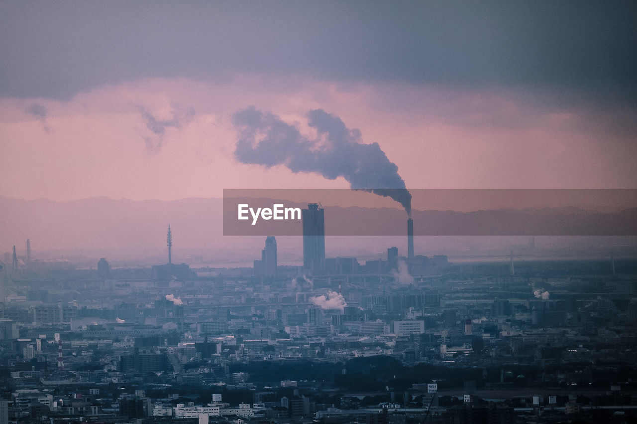 Cityscape against sky during sunset