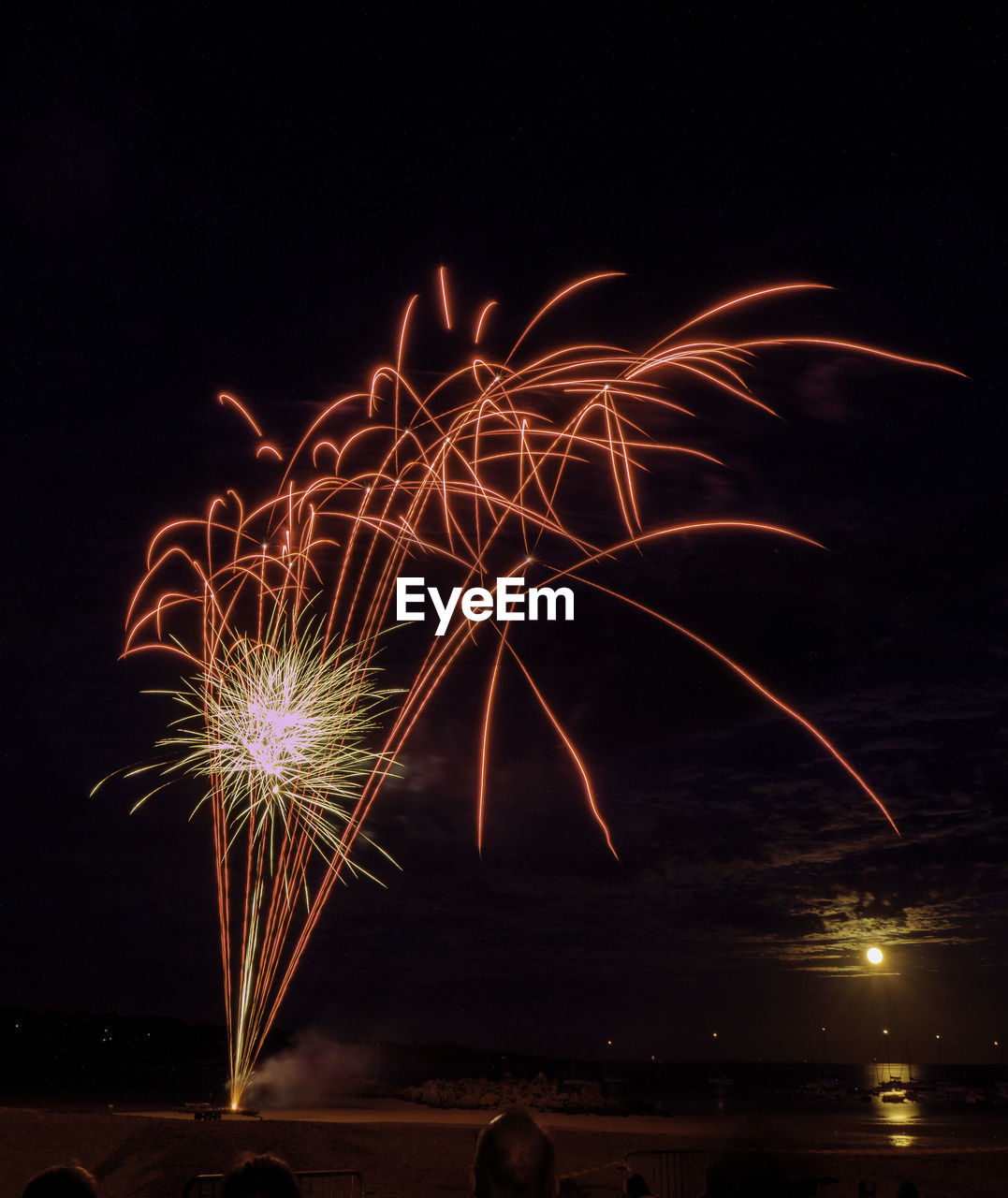 fireworks, night, celebration, motion, firework display, illuminated, event, arts culture and entertainment, exploding, firework - man made object, nature, sky, long exposure, recreation, water, new year's eve, glowing, outdoors, blurred motion