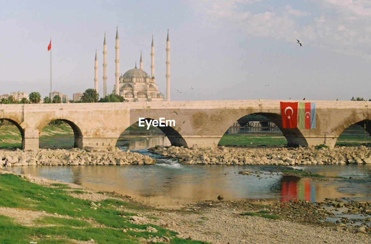 Arch bridge over river