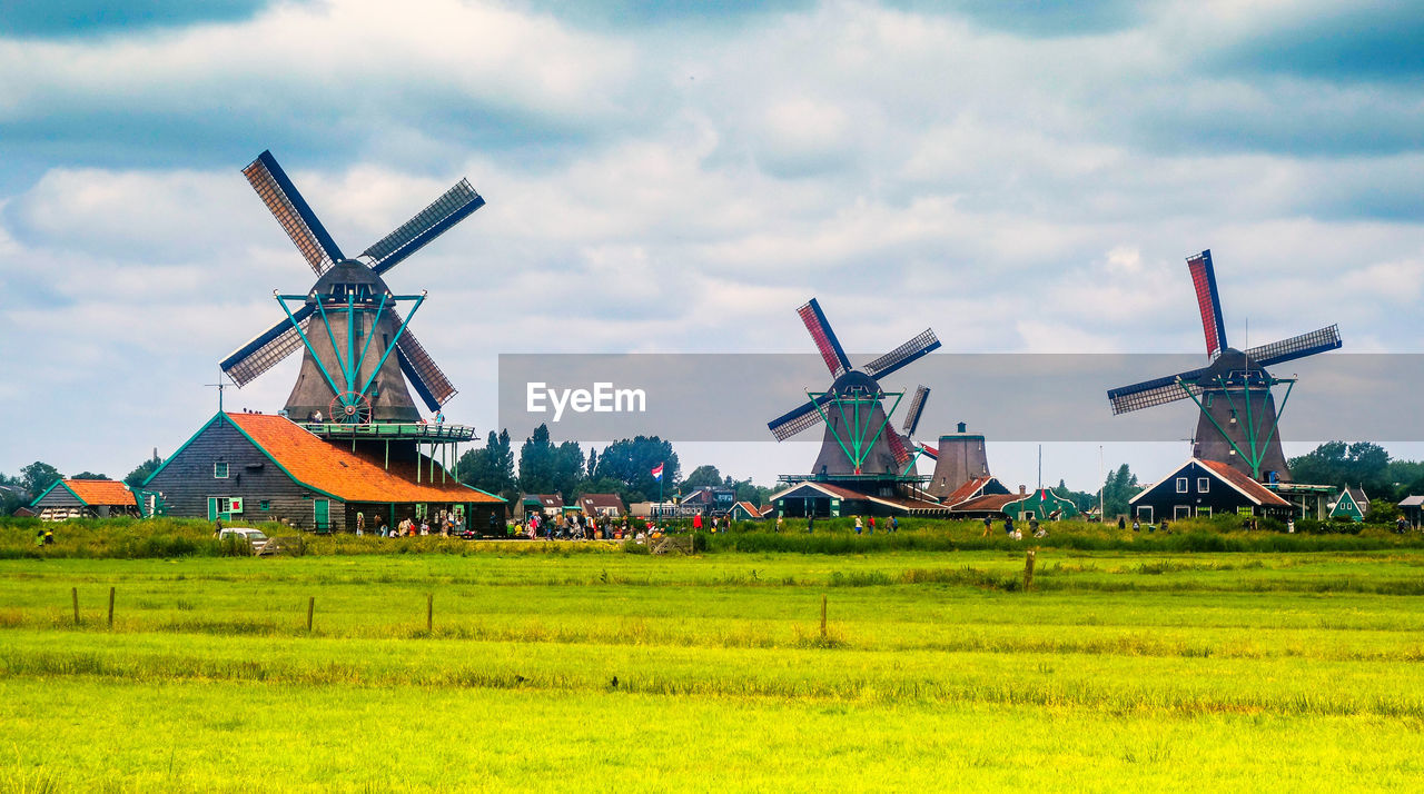 Traditional dutch windmills and cottages in zaanse schans, netherland