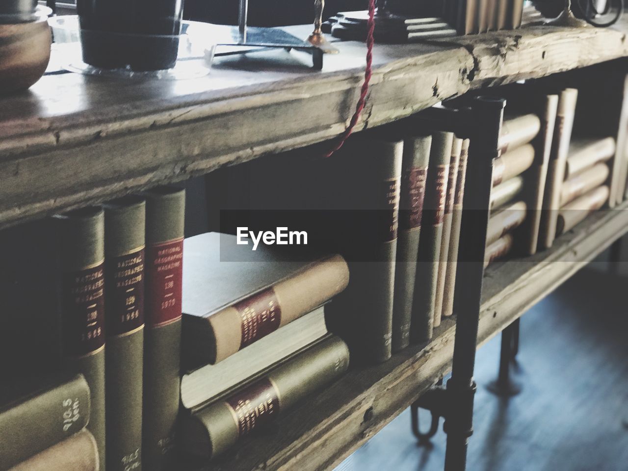 STACK OF BOOKS IN LIBRARY