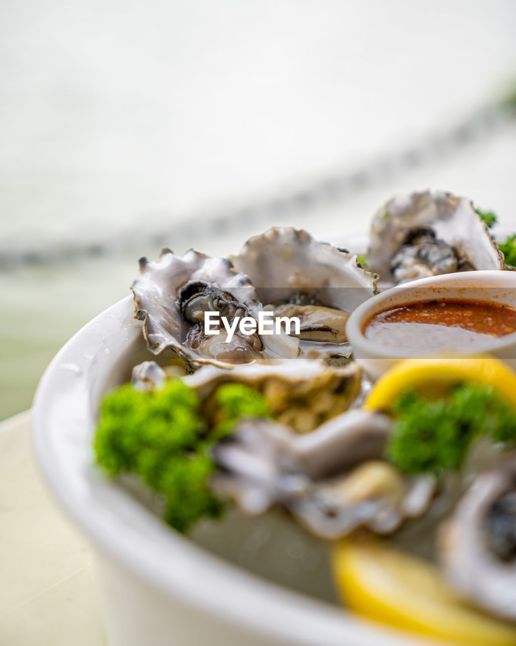 food, food and drink, healthy eating, vegetable, dish, wellbeing, oyster, mussel, no people, seafood, freshness, selective focus, herb, animal, cuisine, meal, savory food, close-up, produce, plant, shellfish, appetizer, parsley, bowl, mushroom, defocused