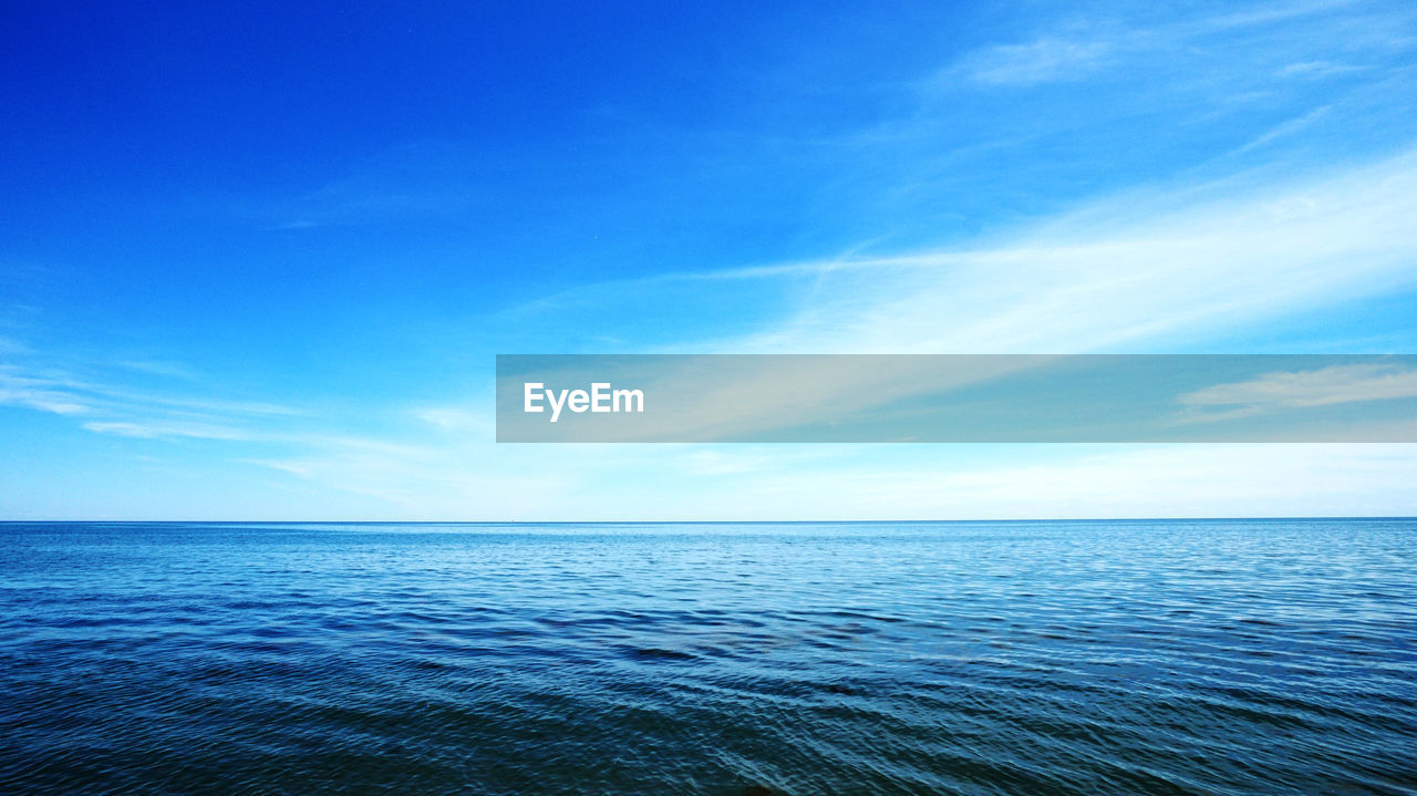 Scenic view of lake ontario against blue sky