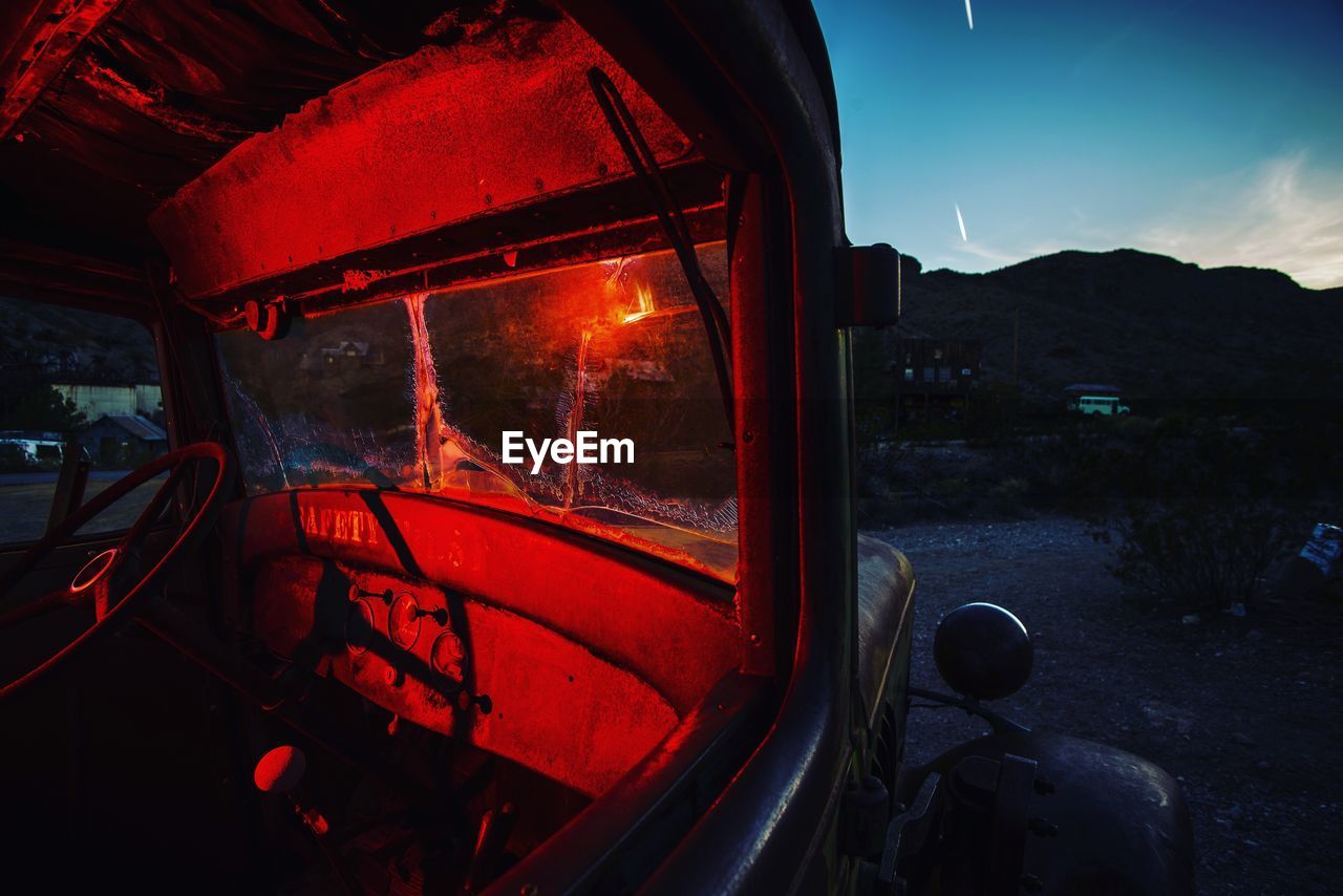 Close-up of illuminated car window at night