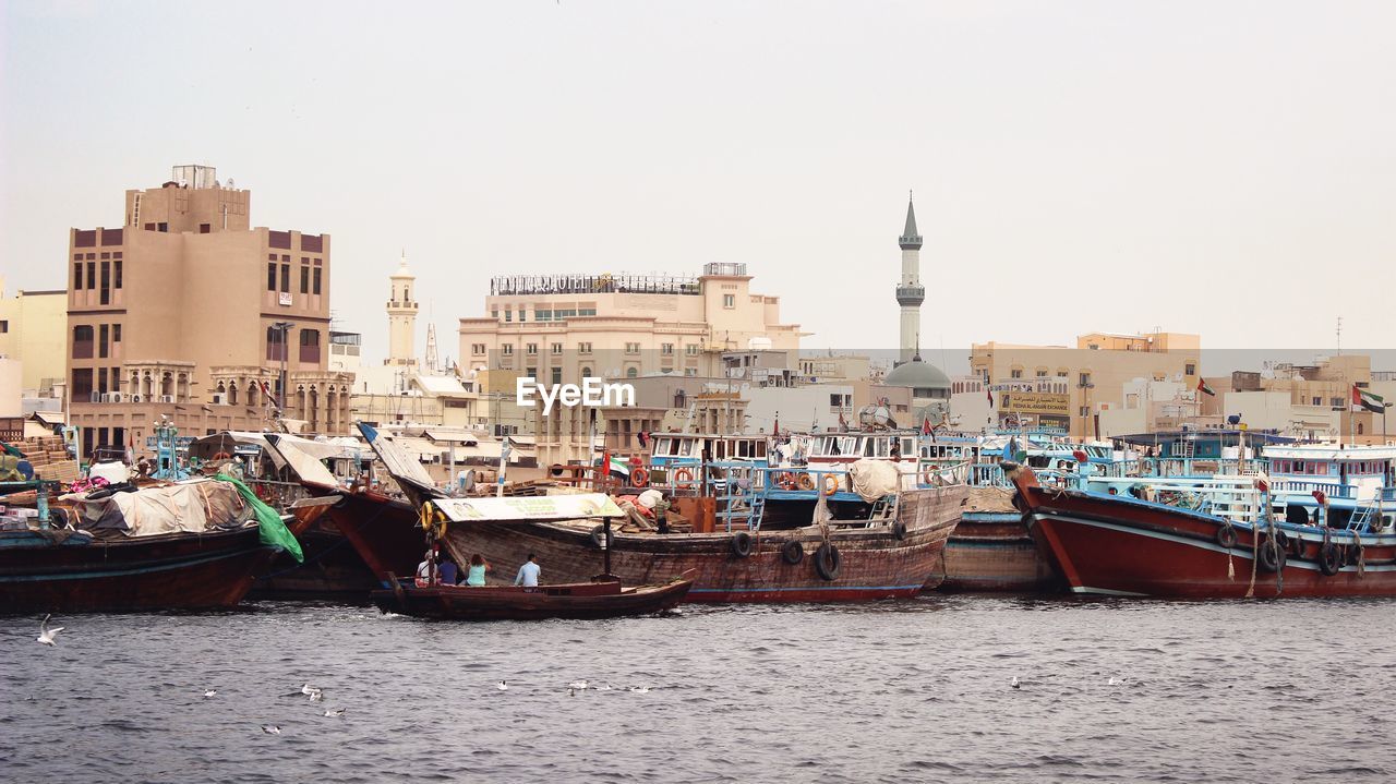 Moored boats against built structures