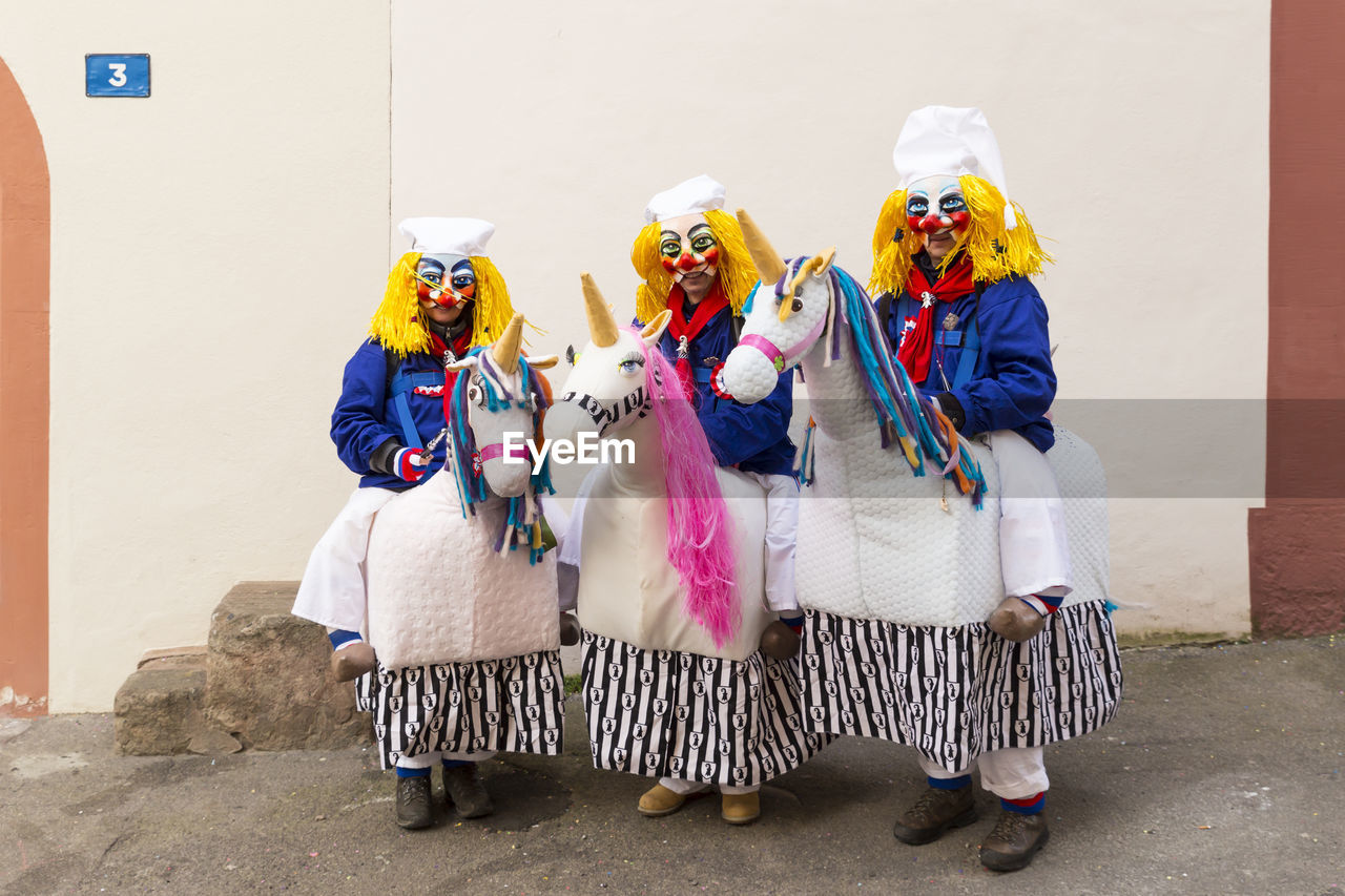 Basel carnival. basel, switzerland - feb 21st, 18. portrait of three participants in horse costumes