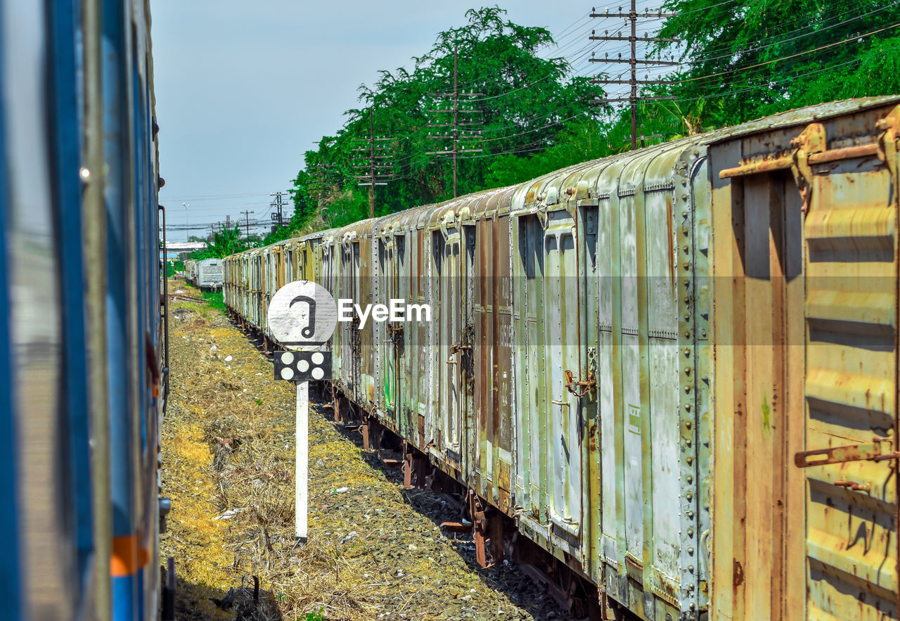 Train on railroad track against sky