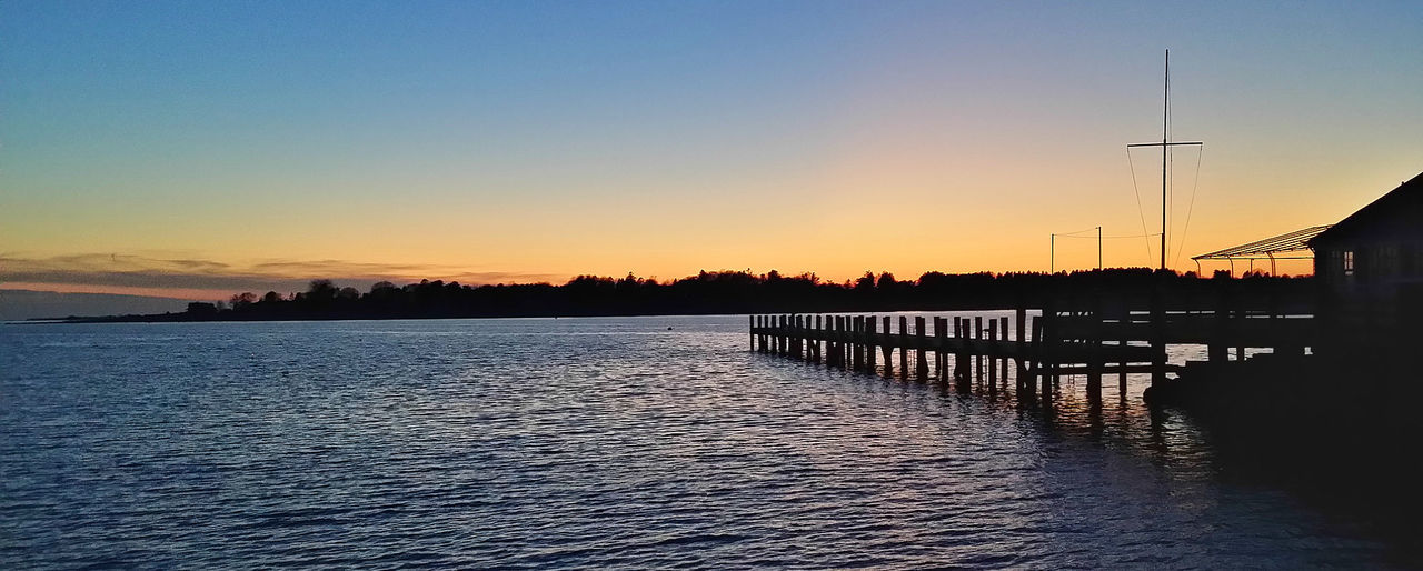 VIEW OF RIVER AT SUNSET