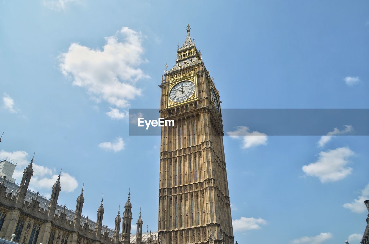 LOW ANGLE VIEW OF CLOCK TOWER