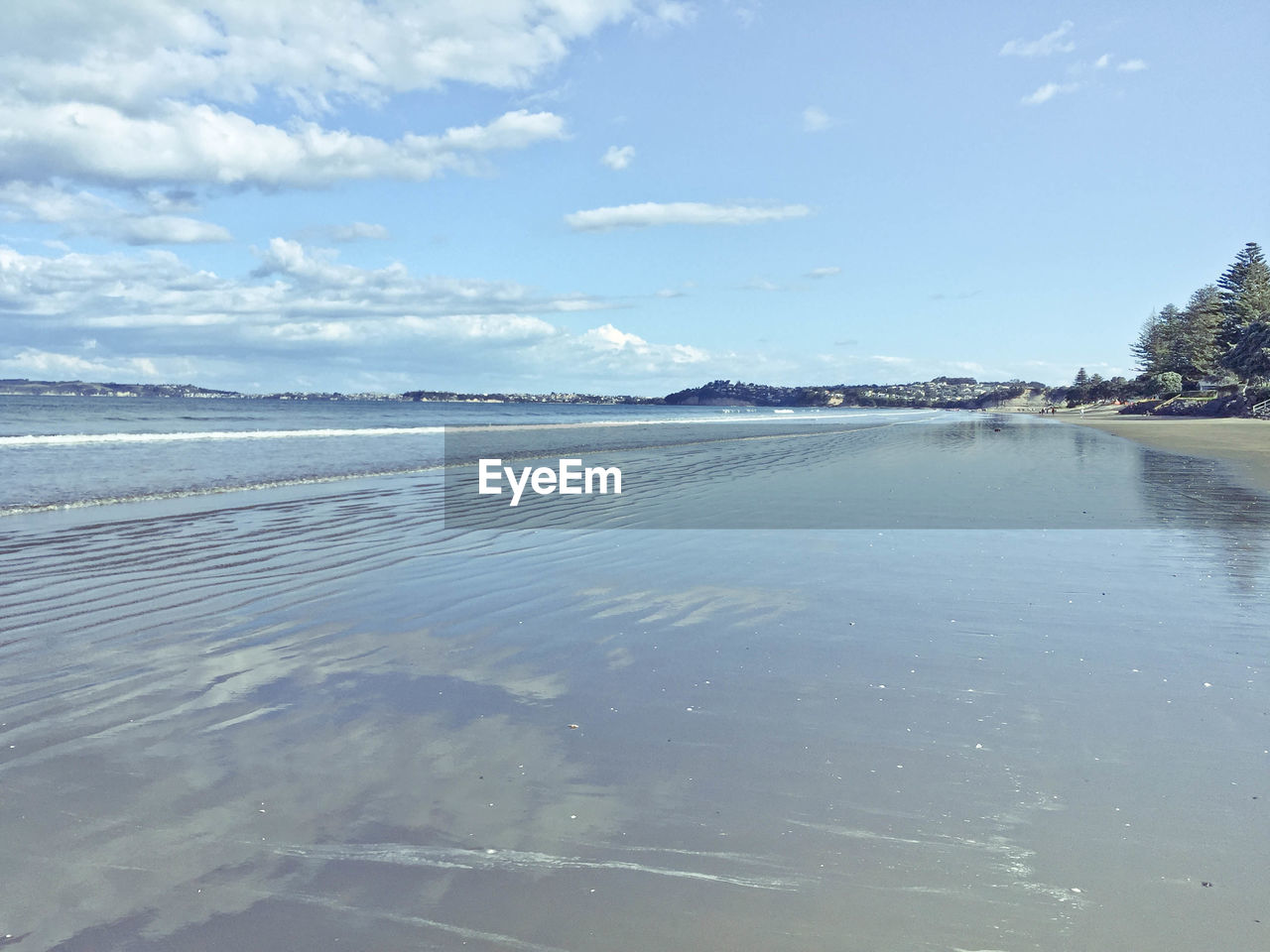 Scenic view of beach against sky