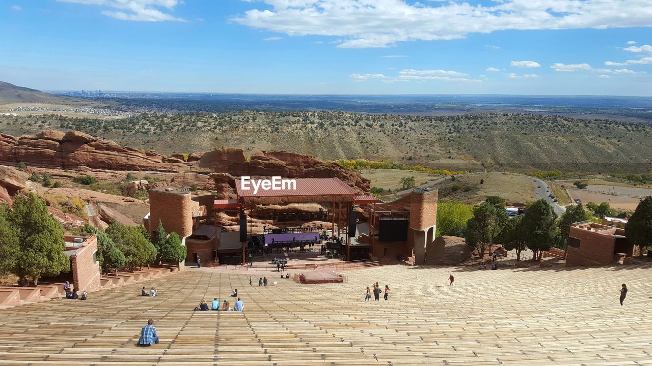 HIGH ANGLE VIEW OF PEOPLE AT TOWN SQUARE