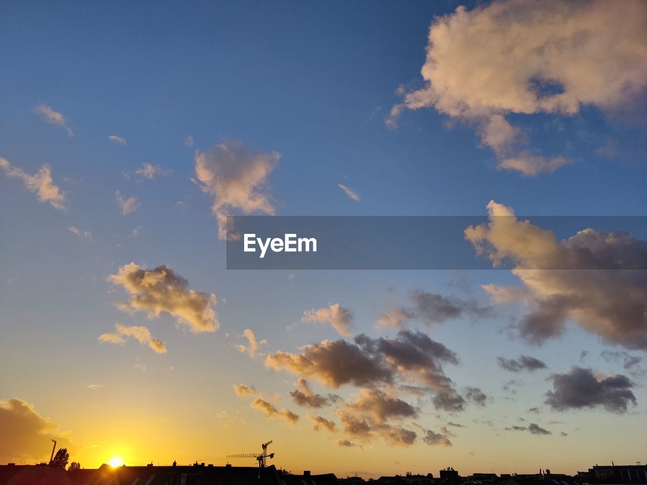 Low angle view of sky and clouds during sunset