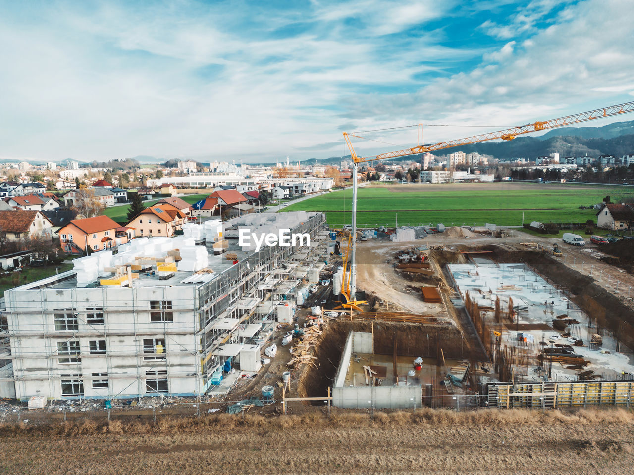 high angle view of buildings in city against sky