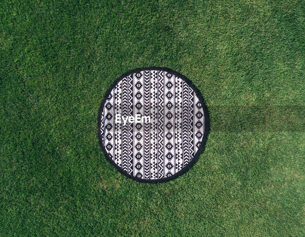 Close-up of textile on grass