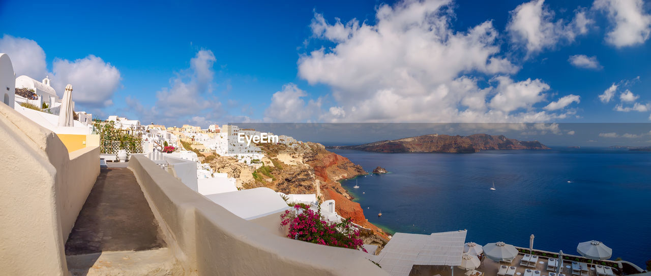 Amazing panorama santorini island view. beautiful white cave houses. santorini, cyclades, greece