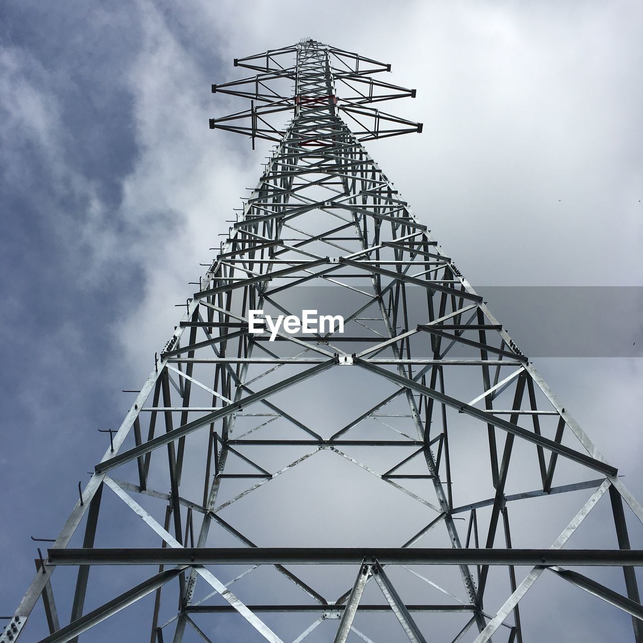 LOW ANGLE VIEW OF TELEPHONE POLE AGAINST SKY
