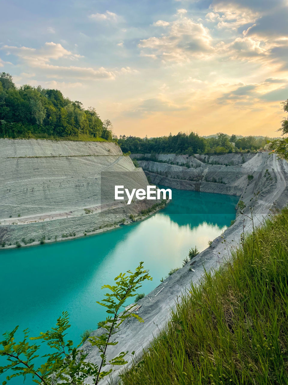 scenic view of river against sky