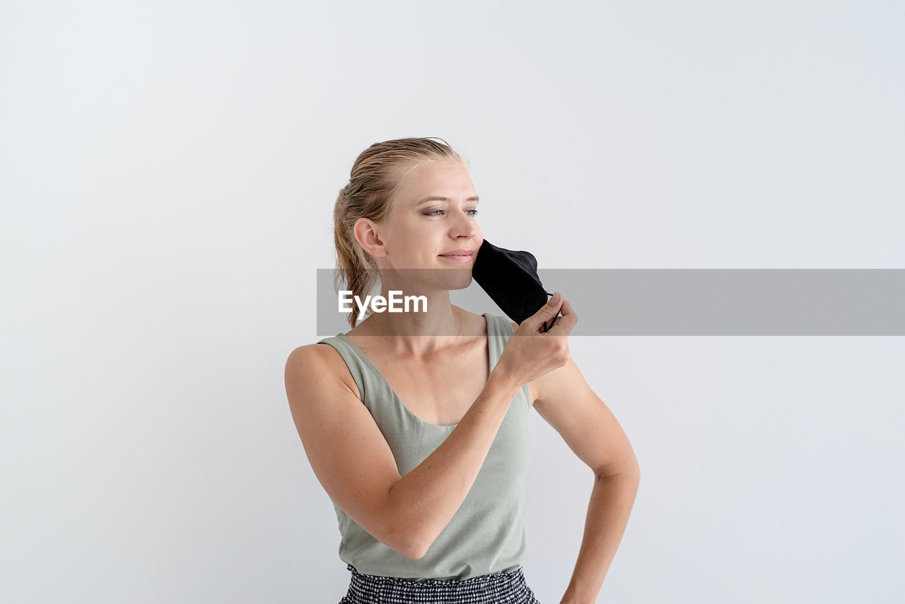 Healthcare concept. young woman in a protective mask, portrait, close up. copy space