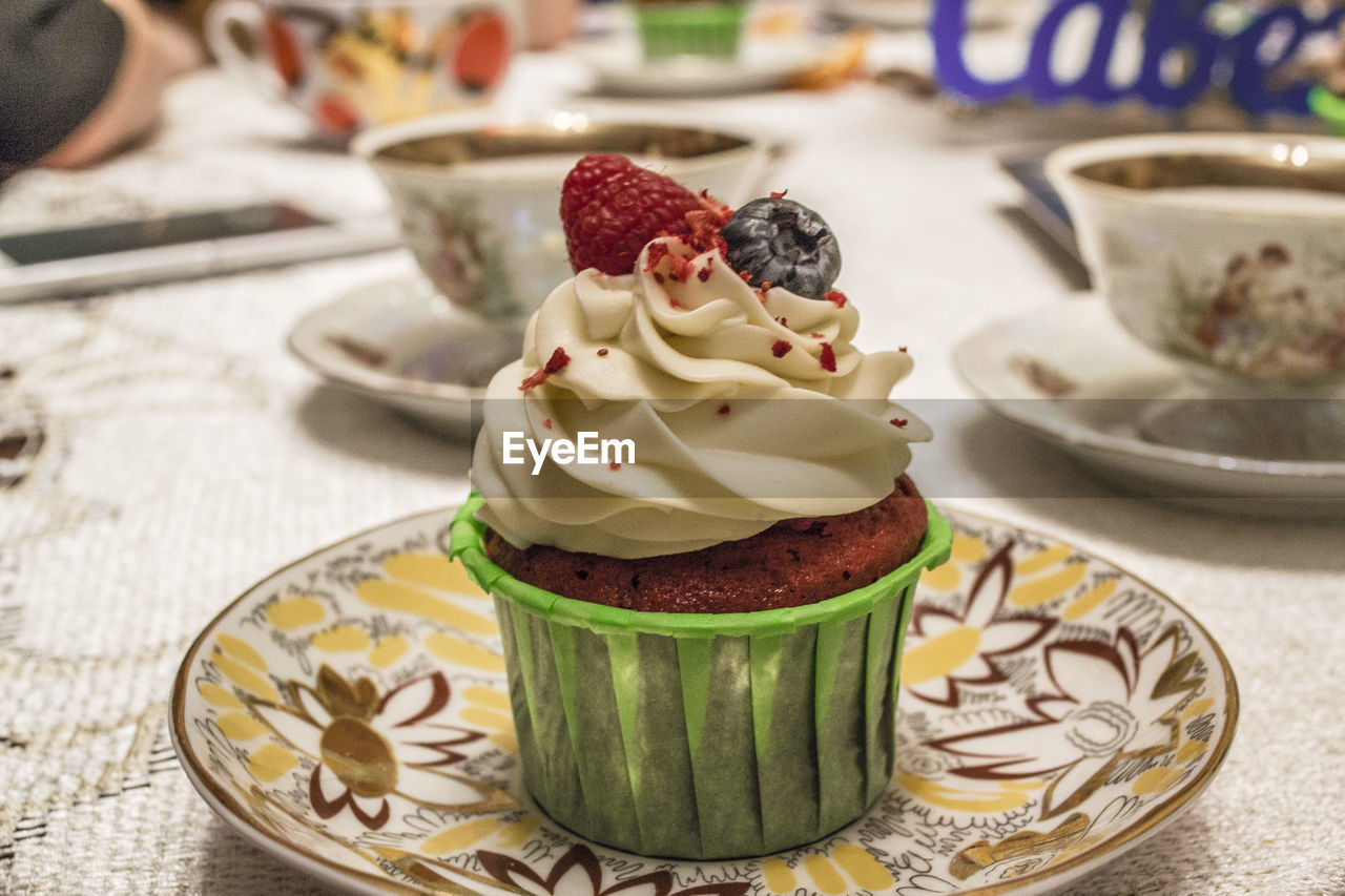 Close-up of cupcake on table