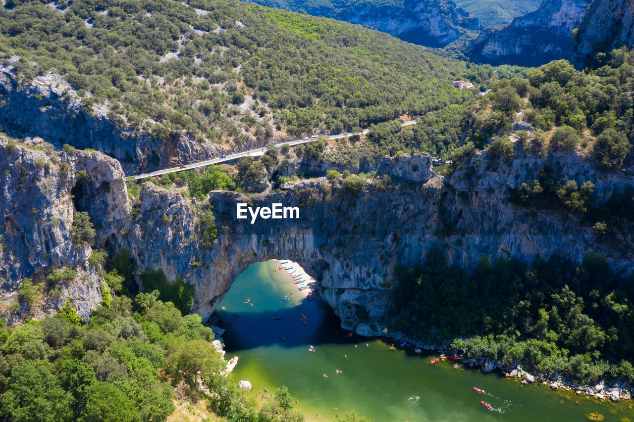 High angle view of natural arch over river