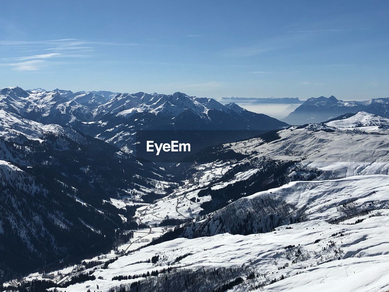 SNOWCAPPED MOUNTAINS AGAINST SKY