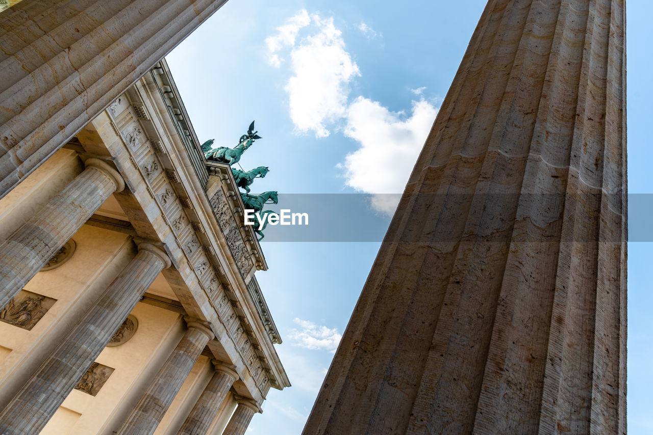 Low angle view of brabdemburg gate in berlin against sky