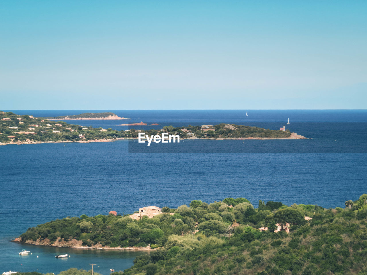 Scenic view of sea against clear sky