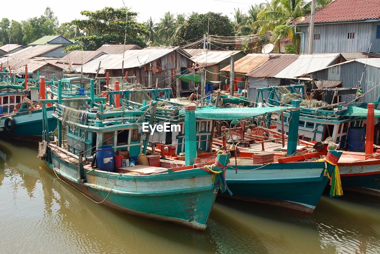 View of boats moored in city