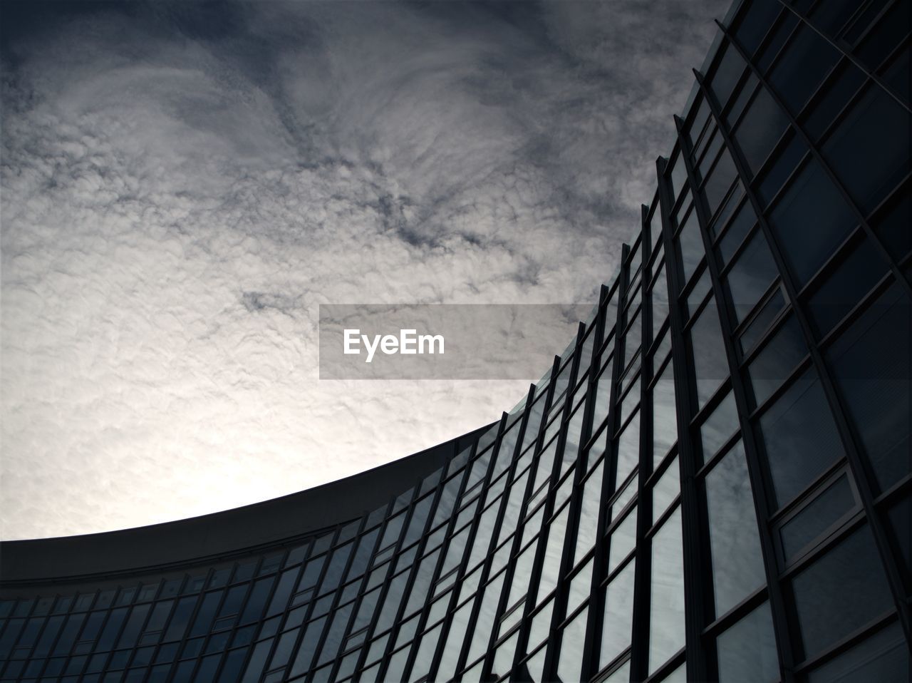 Low angle view of modern building against sky