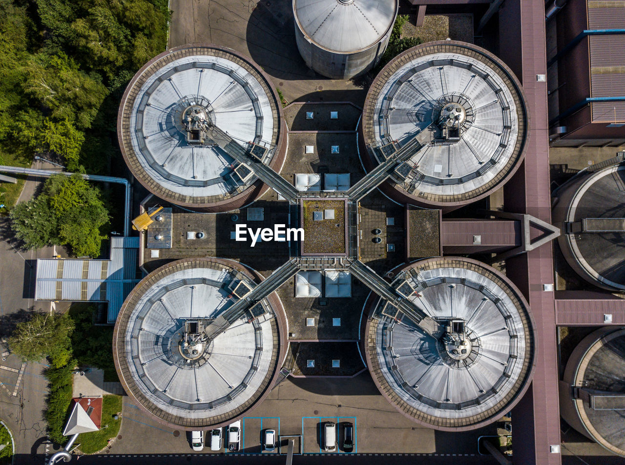 Directly above shot of industrial buildings in city during sunny day