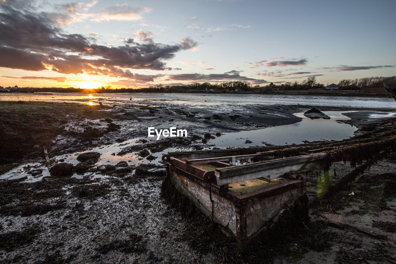 Scenic view of sea at sunset