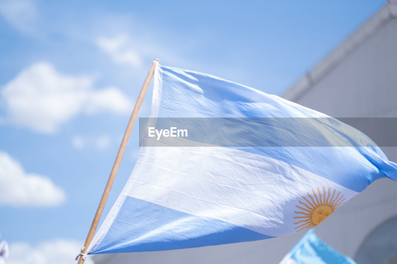 Argentinian flag waving with sky background