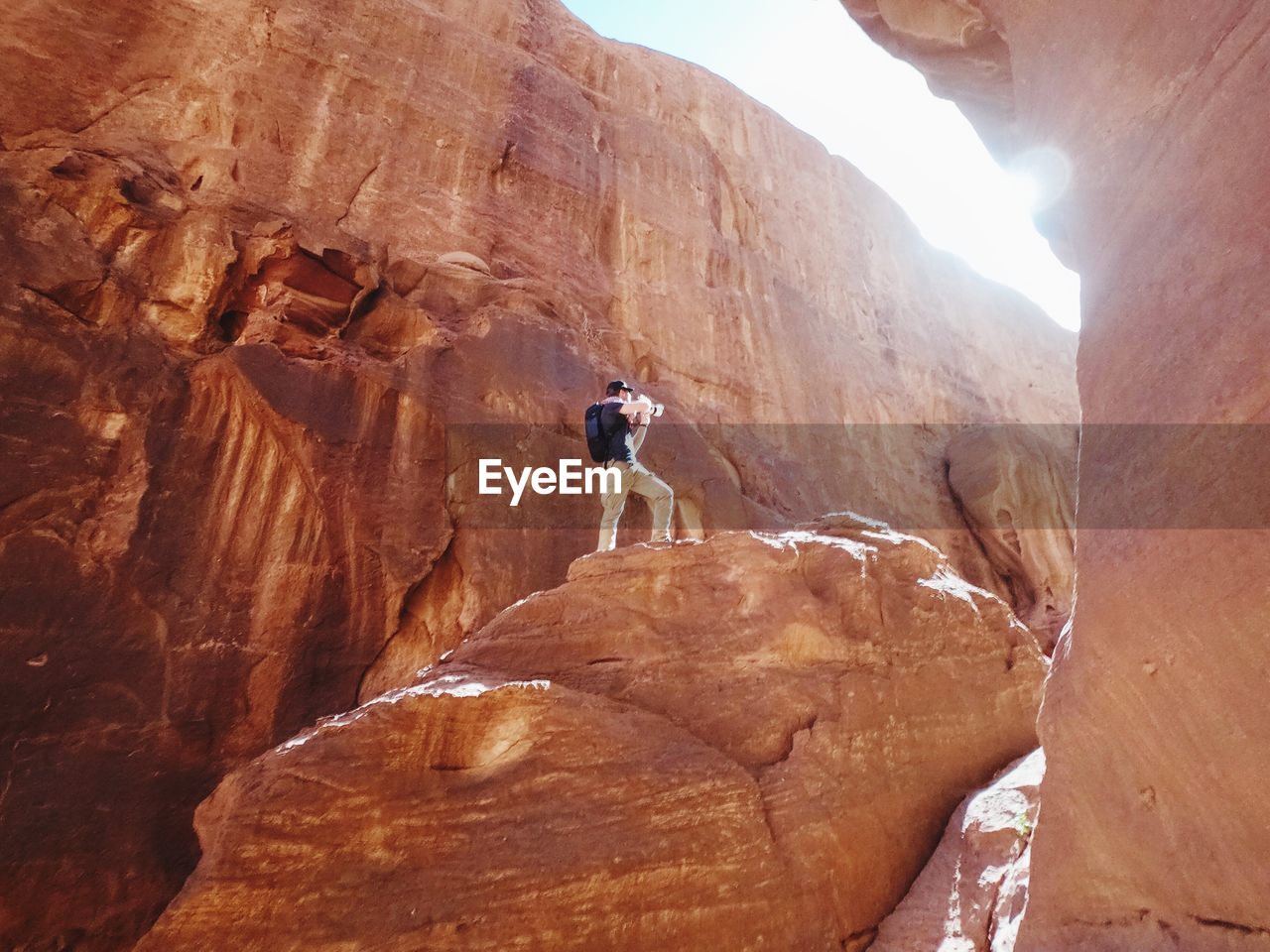 Man standing on rock formation