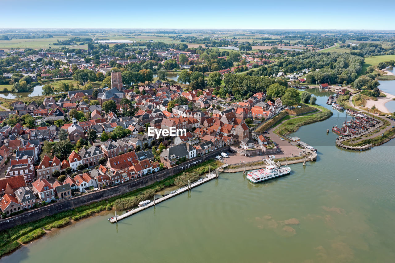 Aerial from the city woudrichem at the river merwede in the netherlands