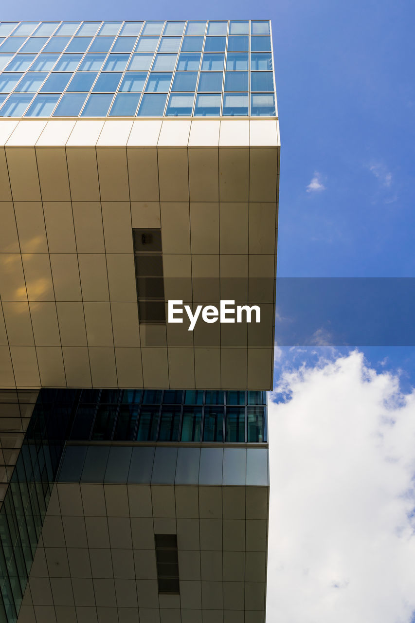 LOW ANGLE VIEW OF BLUE SKY WITH REFLECTION OF CLOUDS