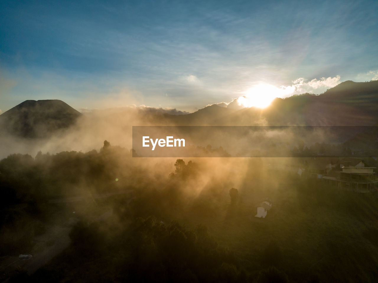 Scenic view of mountains against sky during sunset